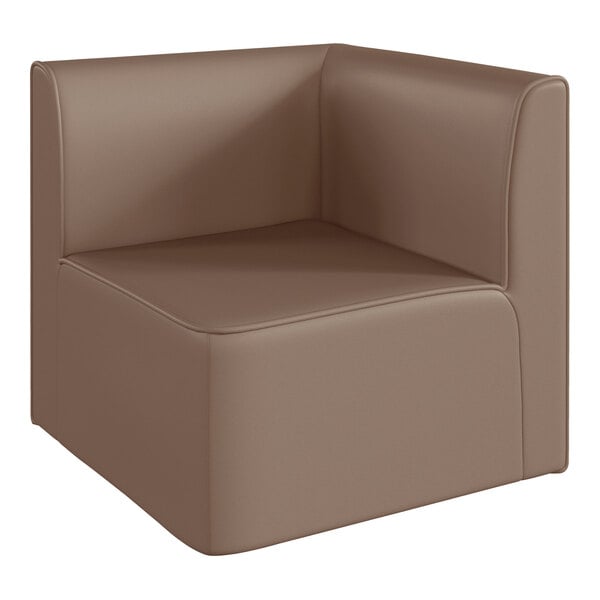 A brown vinyl corner chair with a small cushion.