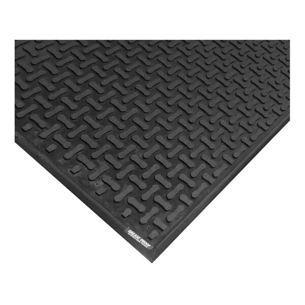A black M+A Matting anti-fatigue mat with a square pattern.