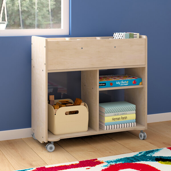 A Flash Furniture wooden double-sided mobile storage cart with clear compartments on wheels.