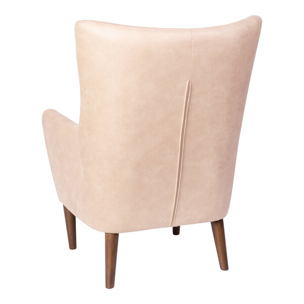 A Flash Furniture Connor light brown faux leather wingback chair.