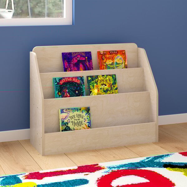 A wooden book display stand with books on it.