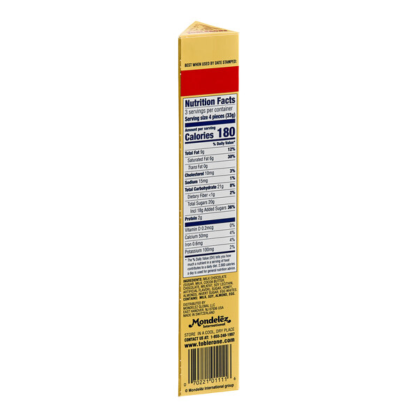 A yellow Toblerone box with blue and red text on a white background.