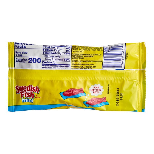 A yellow and white package of Swedish Fish mini candy on a white background.