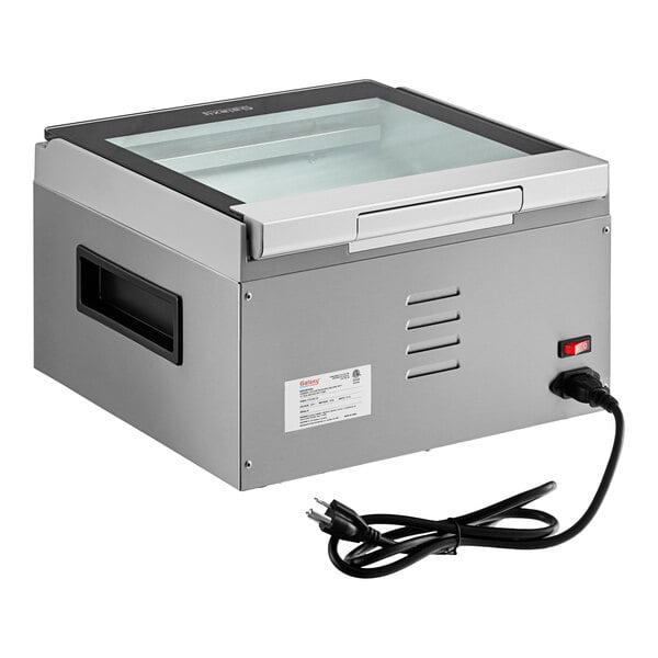 A grey Galaxy vacuum packaging machine on a counter.