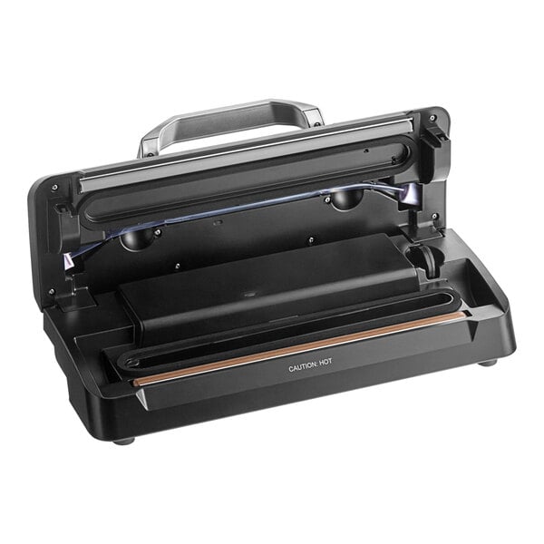 A black Galaxy external vacuum sealer with a handle.