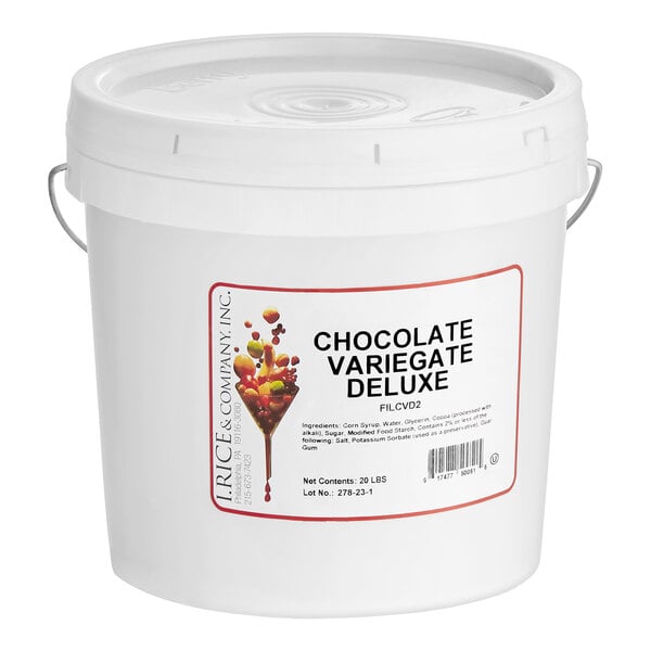 A white I. Rice bucket of chocolate variegate with a label.