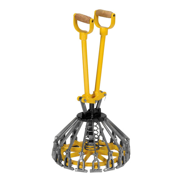 A yellow and silver metal object with handles.