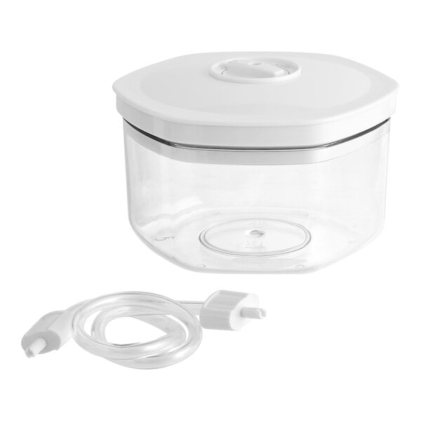 A clear plastic Galaxy VC700 vacuum canister with a white lid.