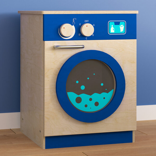 A Flash Furniture wooden toy washing machine with a blue door.