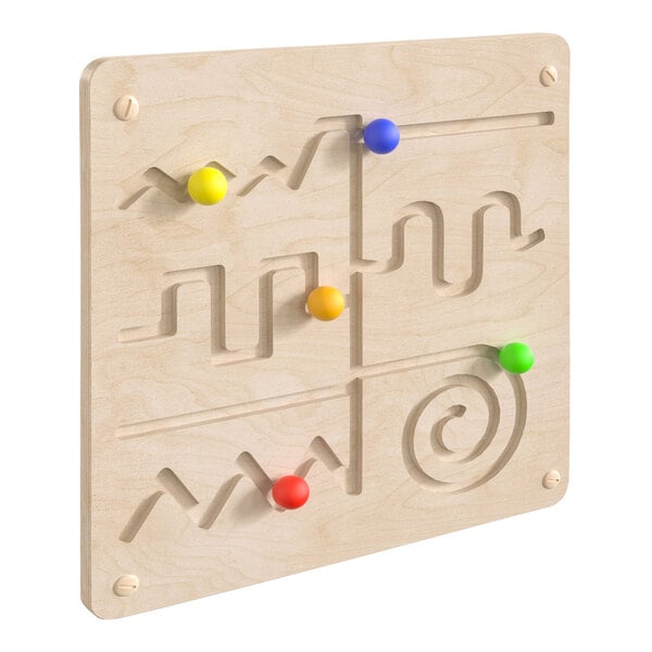 A wooden maze board with colorful balls.