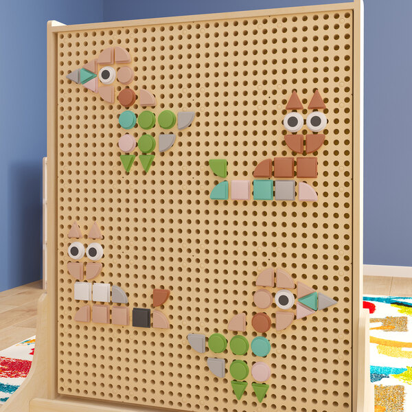 A wooden peg board with different colored shapes including pastel colors.