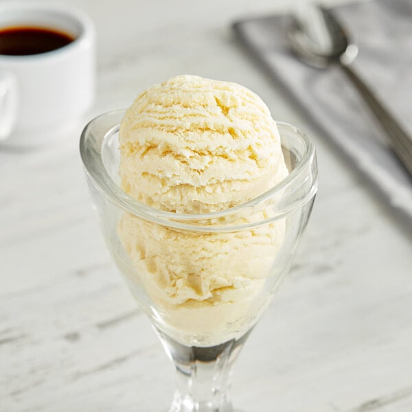 A glass with a scoop of I. Rice Bavarian custard ice cream in it.