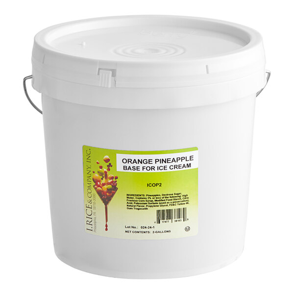 A white I. Rice bucket of pineapple hard serve ice cream base with a lid.