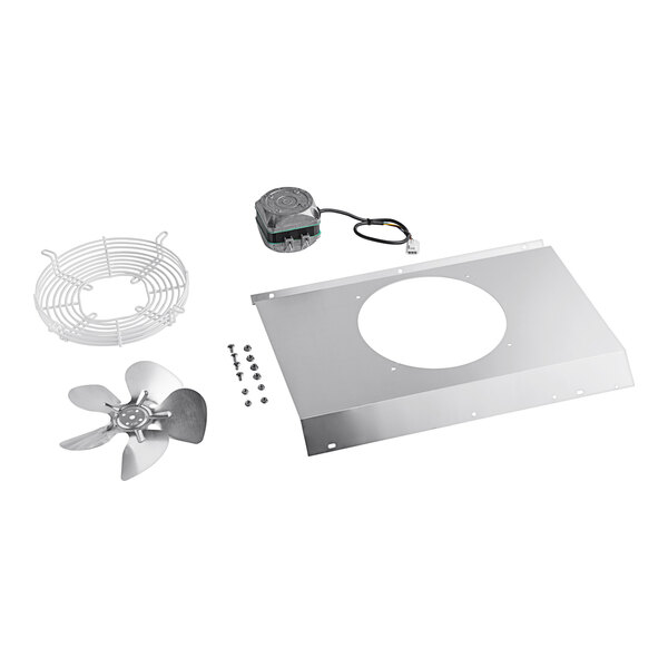 A metal plate with a round hole and a metal box with a white circle and black border inside.