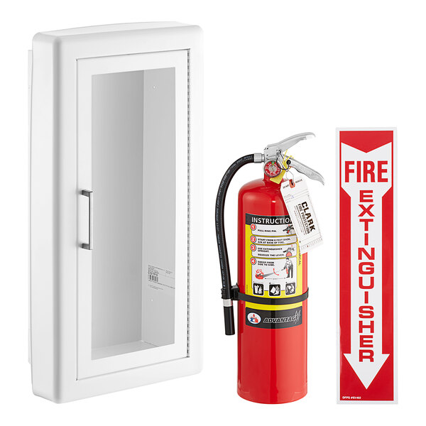 A Badger dry chemical fire extinguisher in a white steel cabinet with a glass door and a Buckeye fire extinguisher label.