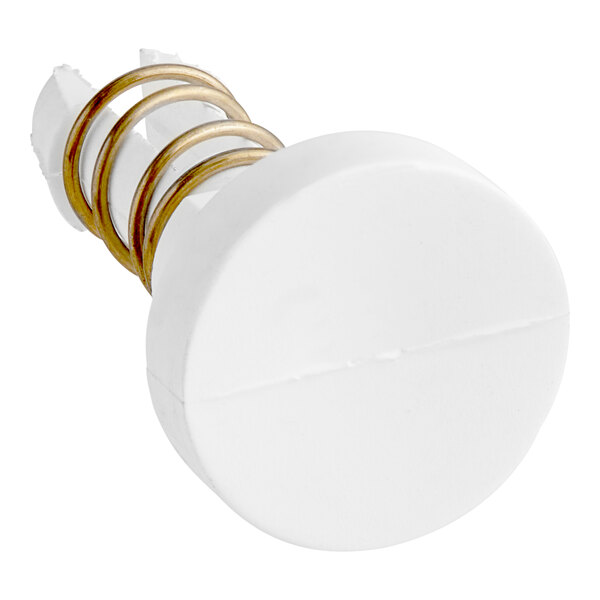 A white knob with gold rings and a metal spring on a spiraled object.