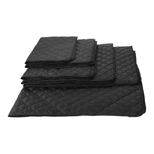 A stack of black RefrigiWear insulated blankets.