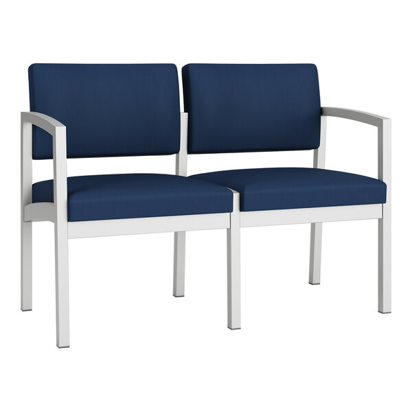 A blue and white Lesro Lenox loveseat with a white frame.