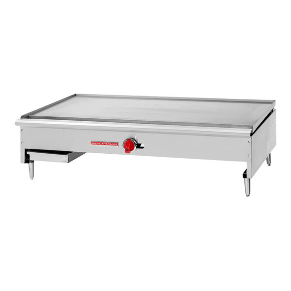 A stainless steel 36-inch teppanyaki Japanese-style griddle with a single control knob and sturdy legs.