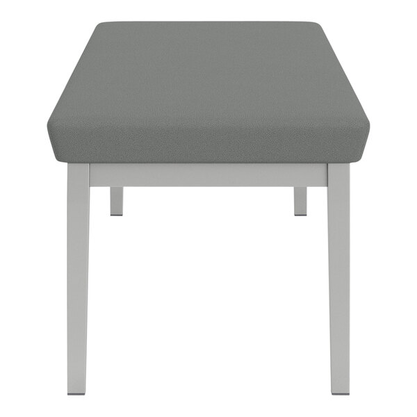 A grey Lesro Lenox steel bench with white legs and arms.