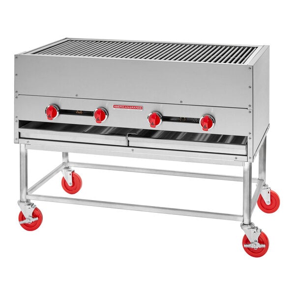 An American Range stainless steel horizontal chicken broiler with red knobs and wheels.