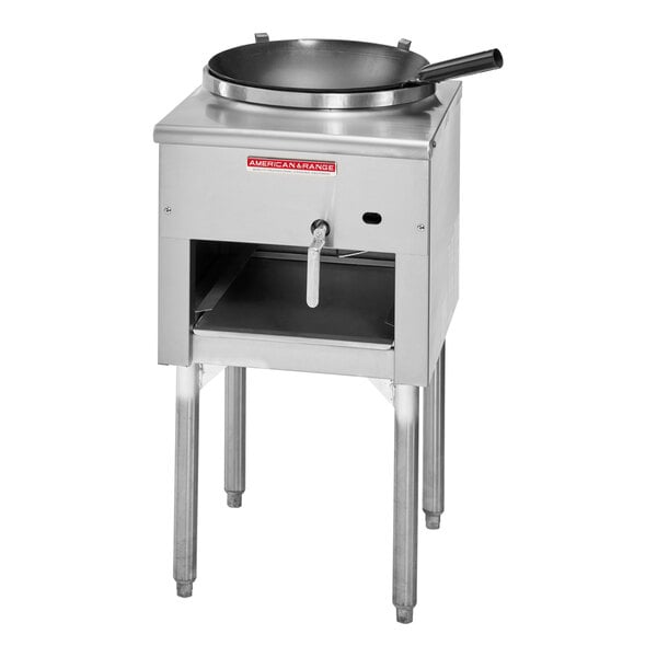 An American Range liquid propane jet wok range with a pan on it.