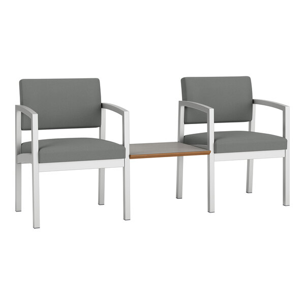 Two grey Lesro Lenox guest chairs with a white Sarum laminate connecting table.