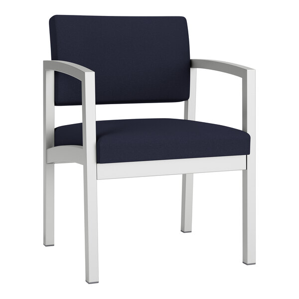 A navy blue Lesro Lenox guest chair with white legs.