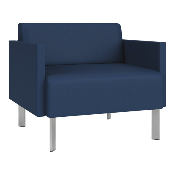 A Lesro Luxe Lounge series bariatric armchair with Imperial blue vinyl and steel legs.