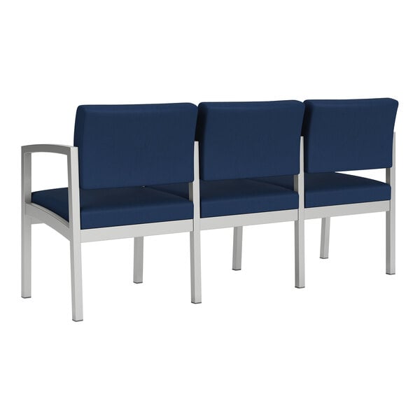 A row of three blue Lesro Lenox steel sofas with center arms.