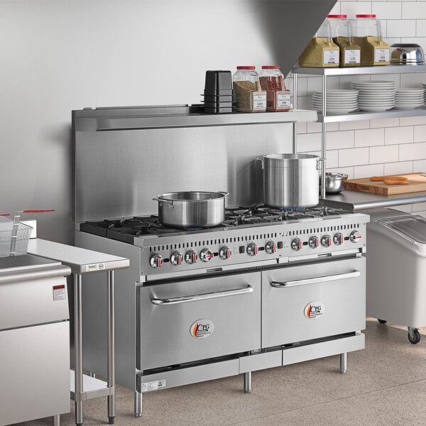 A large stainless steel Cooking Performance Group range in a professional kitchen.