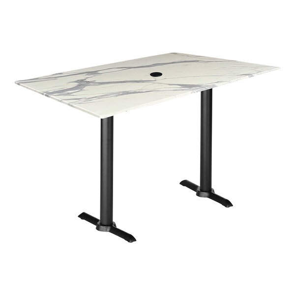 A white marble Holland Bar Stool EuroSlim counter height table with black end column base.