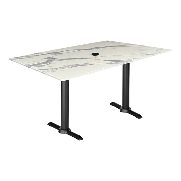 A white marble Holland Bar Stool EuroSlim table with black legs.