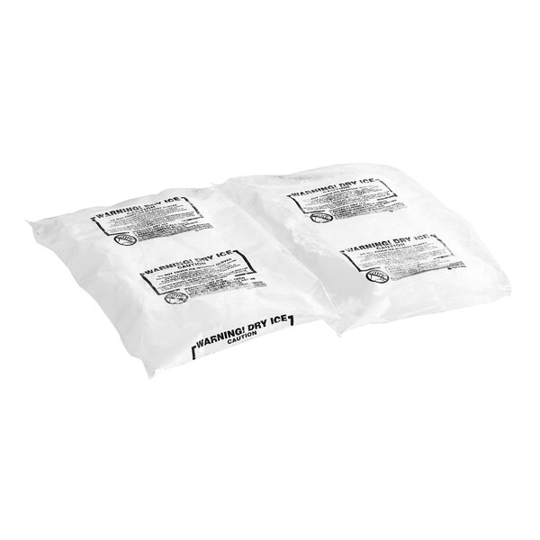 A group of white plastic bags of 10 lb. dry ice.