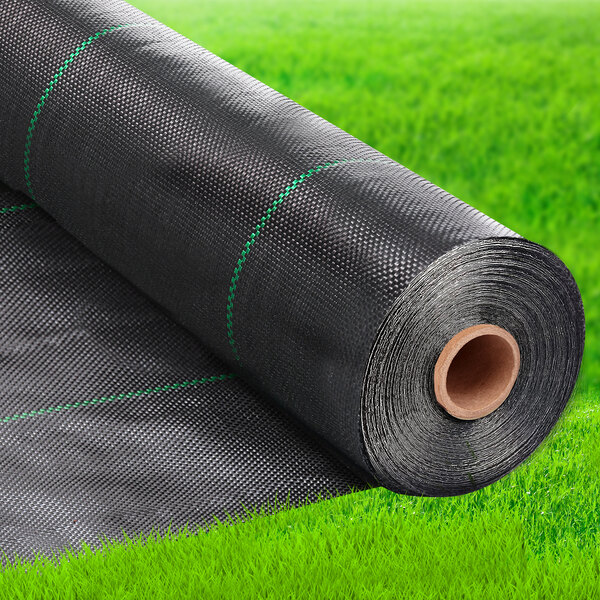 A roll of SEALTECH black premium weed barrier landscape fabric.