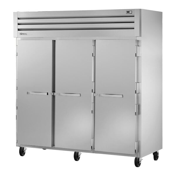 A True Spec Series reach-in refrigerator with solid doors.