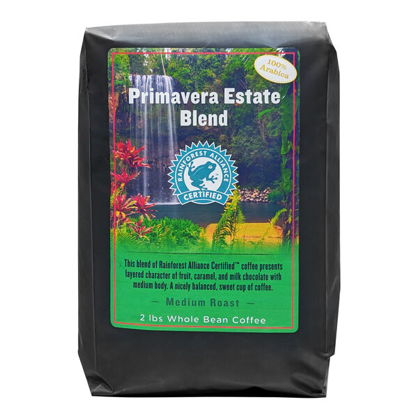 A black bag of Lacas Coffee Primavera Estate Blend whole bean coffee with a white label.
