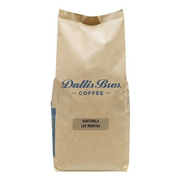 A brown bag with blue text that reads "Dallis Bros Guatemala Los Moritas Whole Bean Coffee"