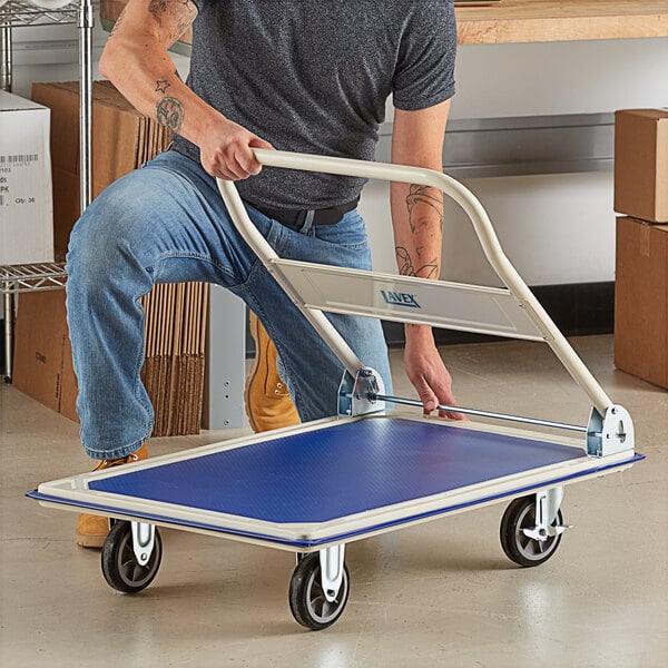 A blue and silver steel folding platform truck with four wheels and a handle, designed for transporting heavy items.