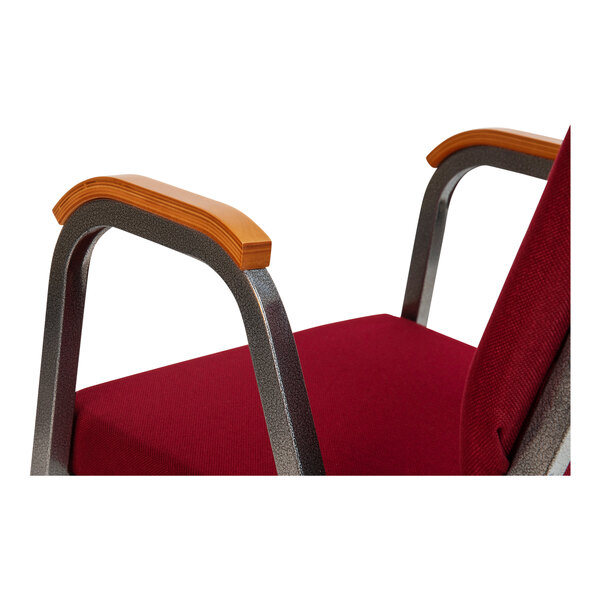 A Flash Furniture burgundy church chair with silver vein frame and wood arms.