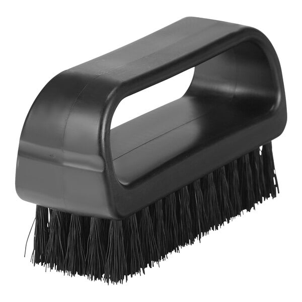 A Remco black nail brush with medium bristles and a black handle.