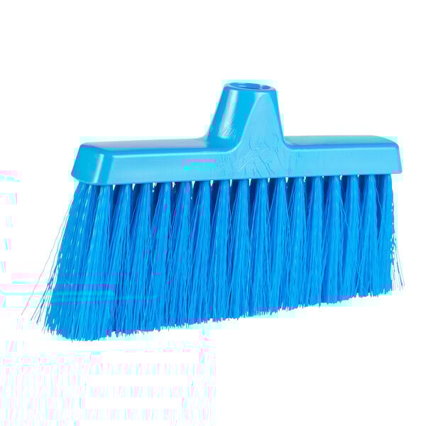 A close up of a blue brush with long bristles.