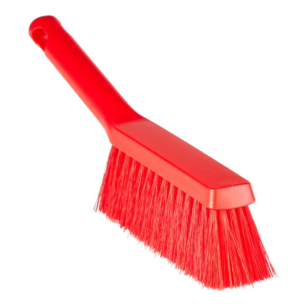 A red Remco ColorCore bench brush with a long handle.