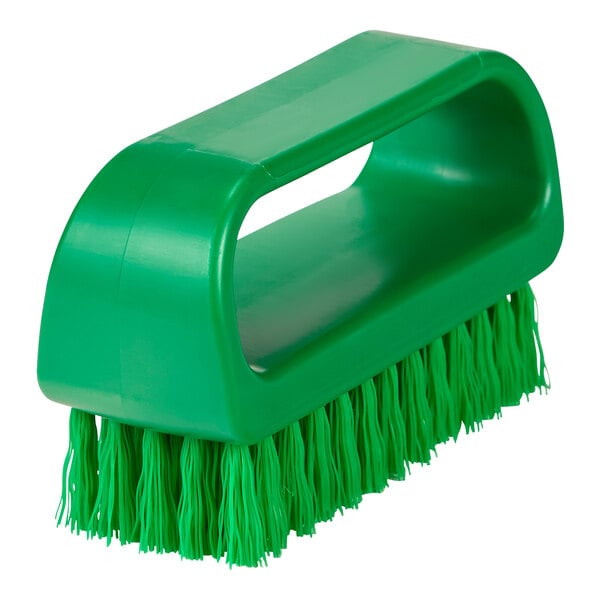 A Remco green nail brush with medium bristles.