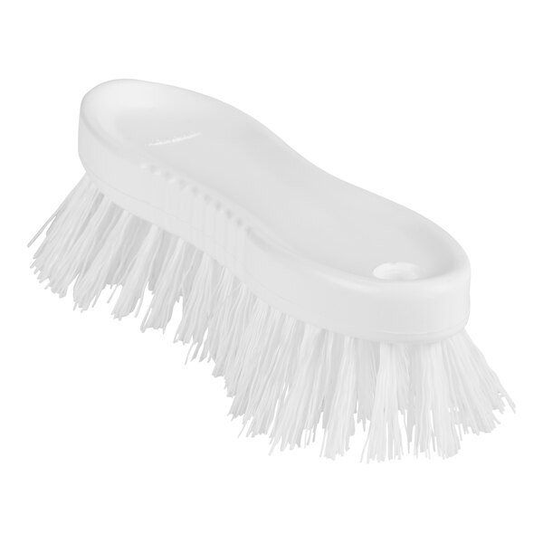 A white Remco scrubbing brush with white bristles.