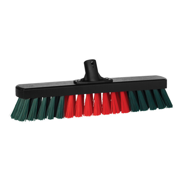 A close up of a black and green Vikan Transport garage broom head with red and green bristles.