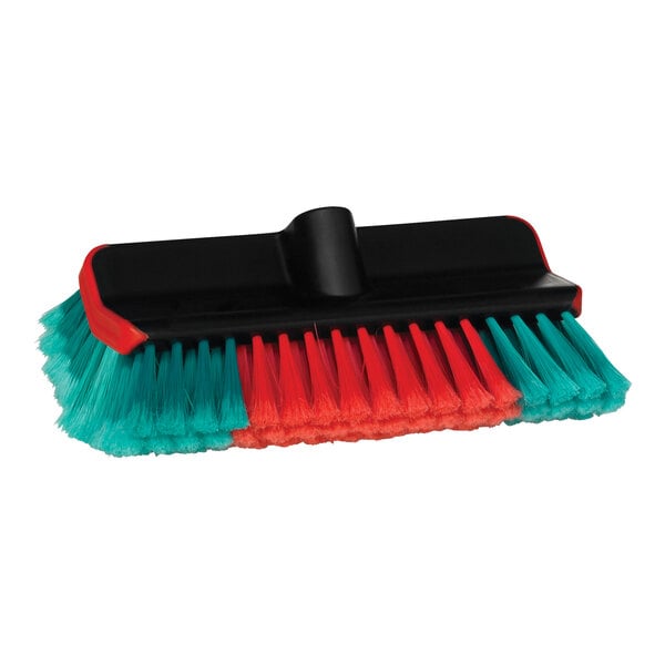 A close-up of a black Vikan water-fed washing brush head with red and green bristles.