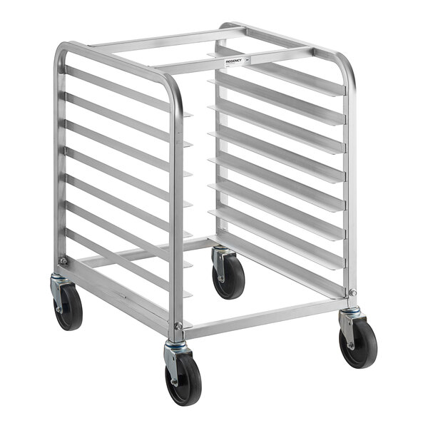 A metal rack on four wheels with multiple horizontal slots for holding trays or pans.