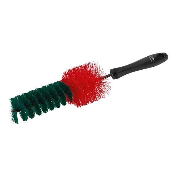 A red and green Vikan Transport stiff rim cleaner with a black handle.
