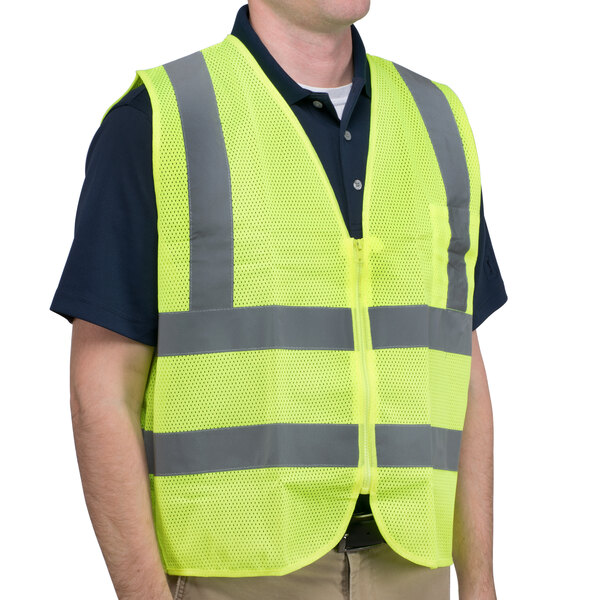 A man wearing a yellow Cordova Class 2 high visibility safety vest.